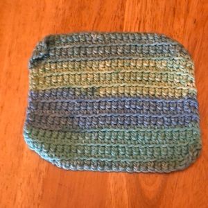 Handmade and crochet 7 x 6 green and blue washcloth or dishcloth.